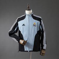 Cortavientos Real Madrid Negro y Gris 04/05 Adultos