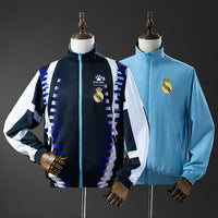 Cortavientos Reversible Real Madrid Azul Marino - Celeste Adultos