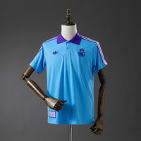 Polo Real Madrid Celeste 25/26 Adultos
