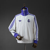 Cortavientos Real Madrid x Beckenbauer Miracle White - Magic Purple Adultos