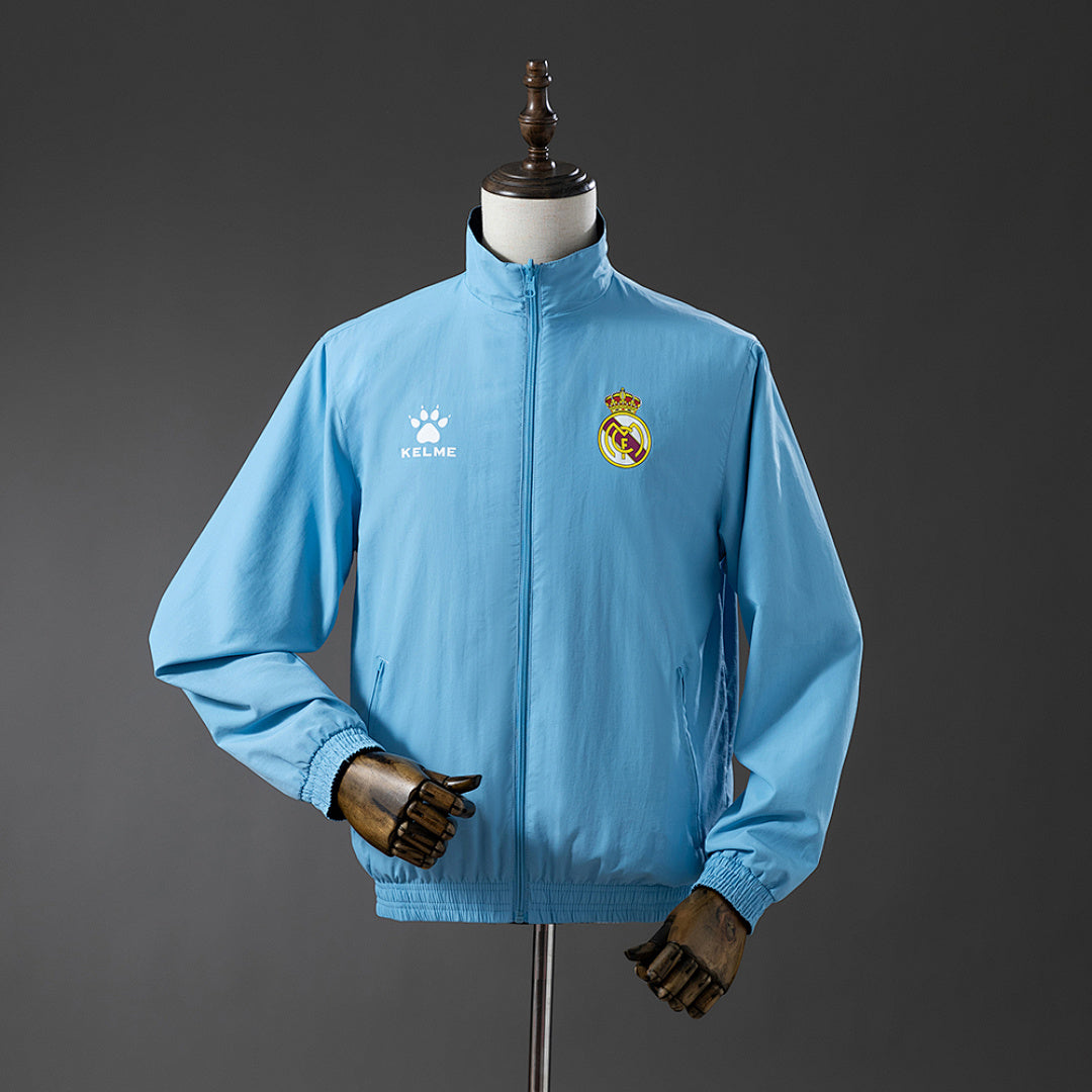 Cortavientos Reversible Real Madrid Azul Marino - Celeste Adultos