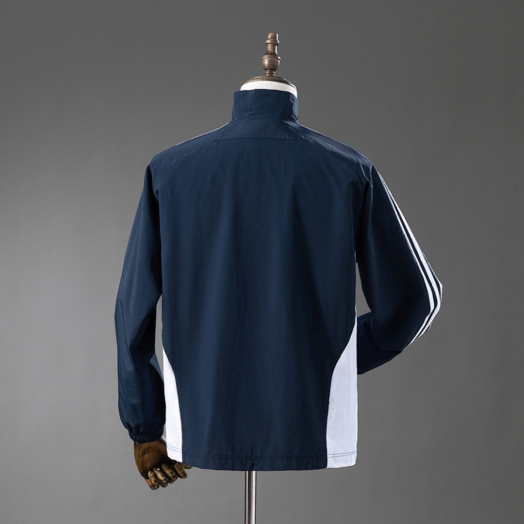 Cortavientos Real Madrid Azul Marino - Blanco Adultos