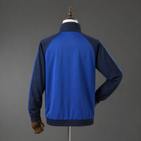 Cortavientos Universidad Católica Azul Adultos Concept