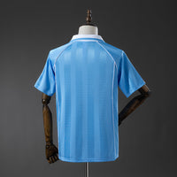 Camiseta Originals Classic Three Stripes Celeste Adultos