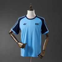 Camiseta Oasis Band Retro Celeste Adultos
