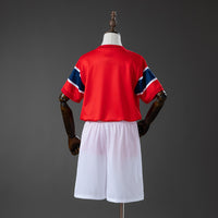 Camiseta + Short Noruega Local 26/27 Niños