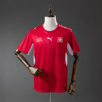 Camiseta Suiza Local 26/27 Adultos