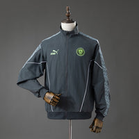 Cortavientos Manchester City Gris 26/27 Adultos